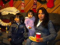 Ana and her children at the Christmas dinner