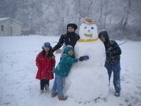 children with snowman
